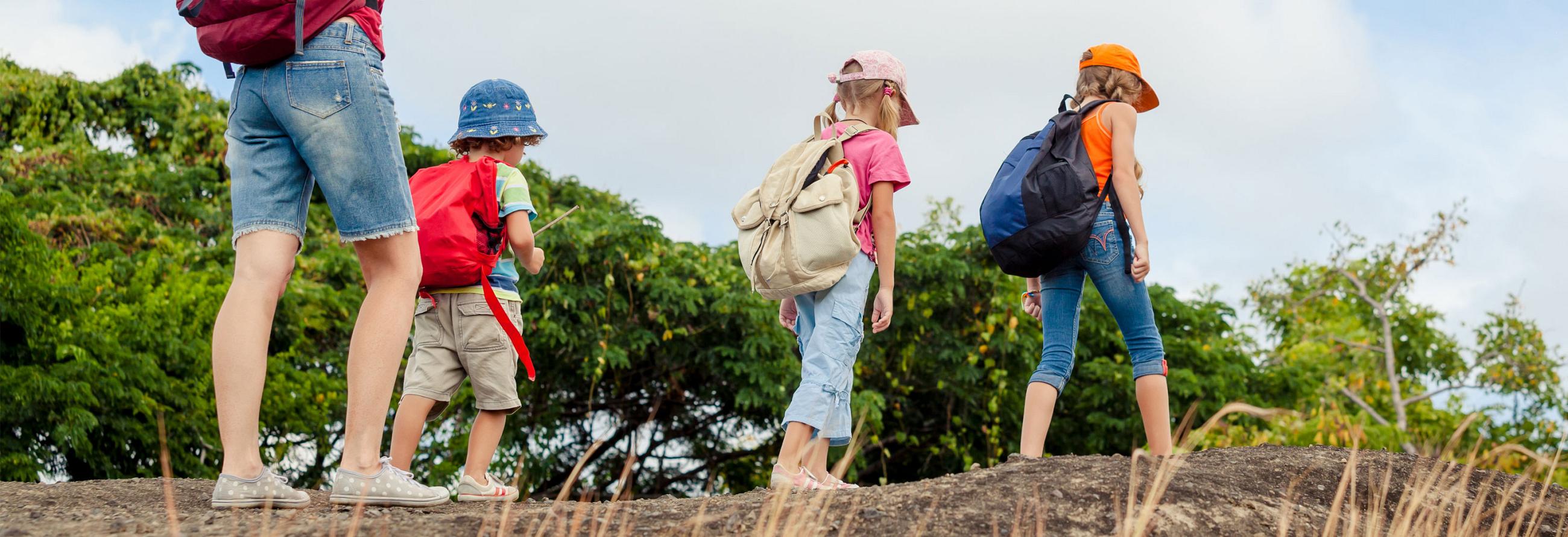 Kids hiking and enjoying their 2017 Sonic Travel Trailer